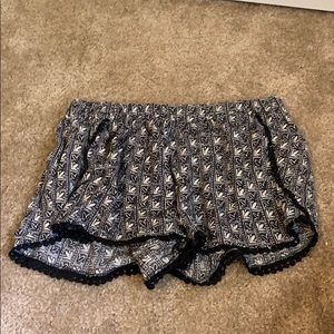 Loose black and white fabric shorts